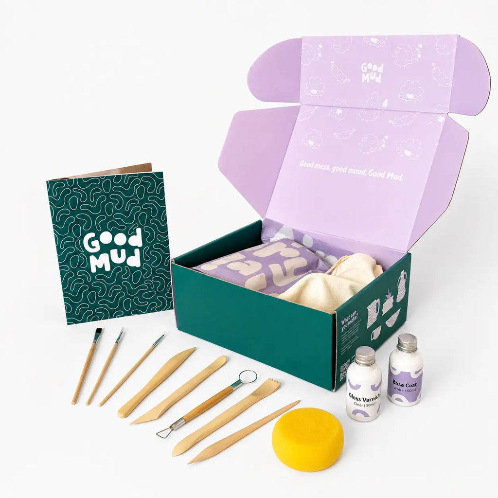 Contents of Good Mud pottery kit with clay and tools