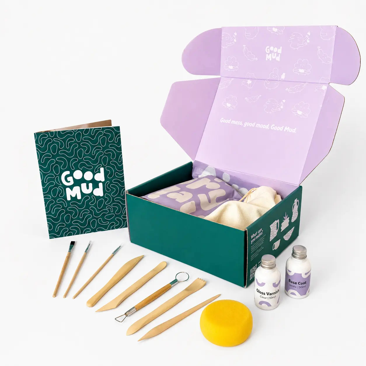 Contents of Good Mud pottery kit with clay and tools