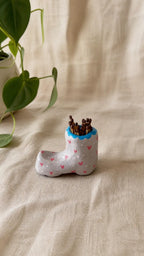 Handmade clay matches holder in shape of a boot with small details