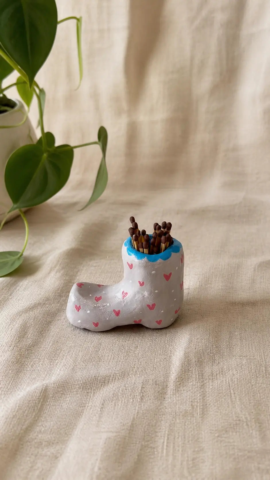 Handmade clay matches holder in shape of a boot with small details