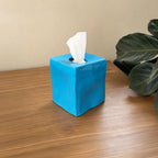 Handmade clay tissue box cover on table