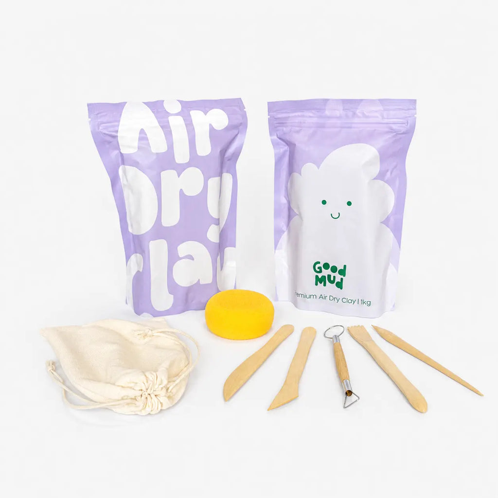 Contents of Good Mud pottery kit with clay and tools