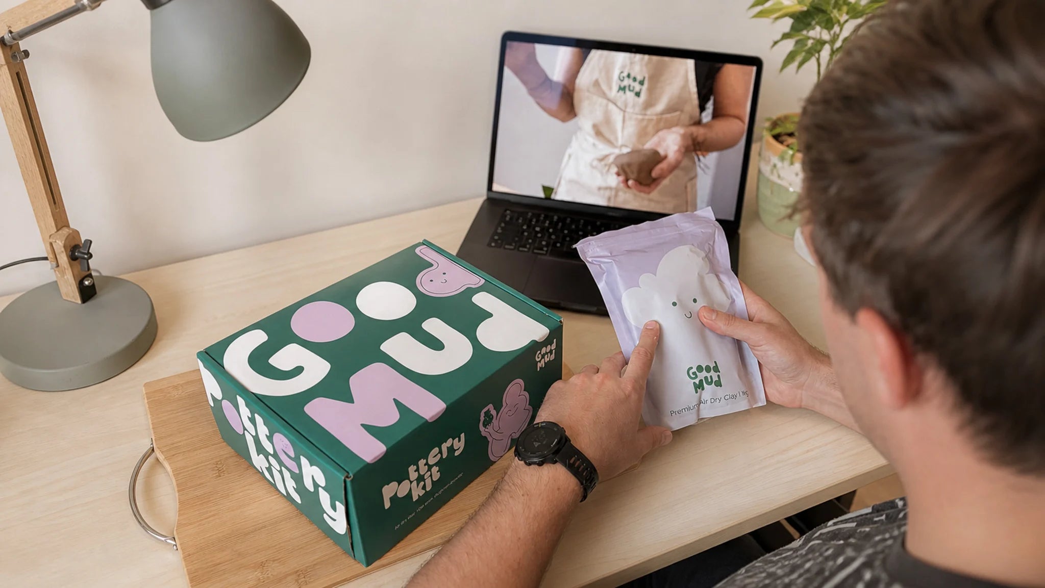 Person doing pottery during a virtual team building session